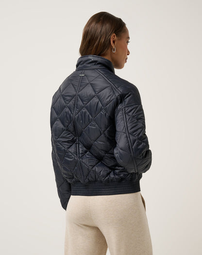 Lights At Night Quilted Jacket Obsidian | Travis Mathew Best Seller