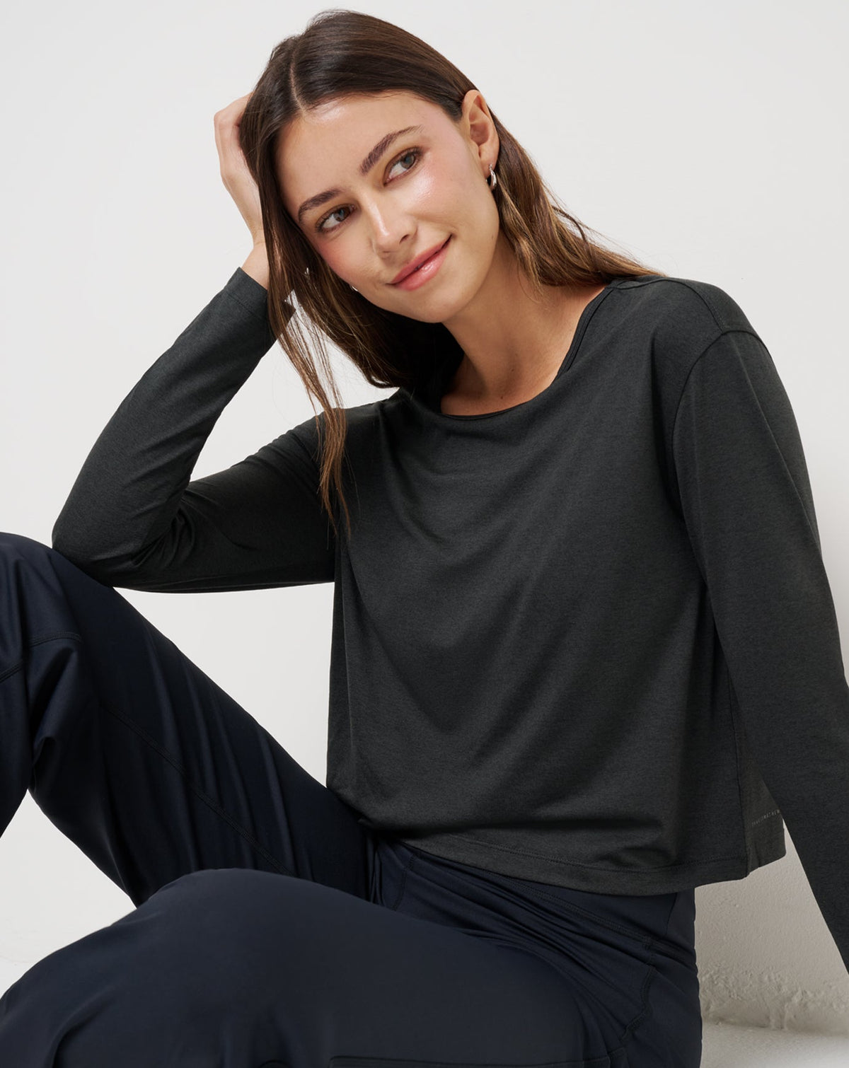 Skyloft Light Celestia Top Heather Black | Travis Mathew Value