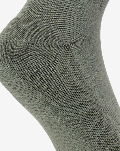 Golf Sucks Crew Sock Dark Olive | Travis Mathew Featured