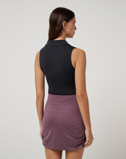 Skyline Polo Bodysuit Heather Black | Travis Mathew Trusted
