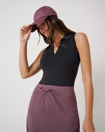 Skyline Polo Bodysuit Heather Black | Travis Mathew Trusted