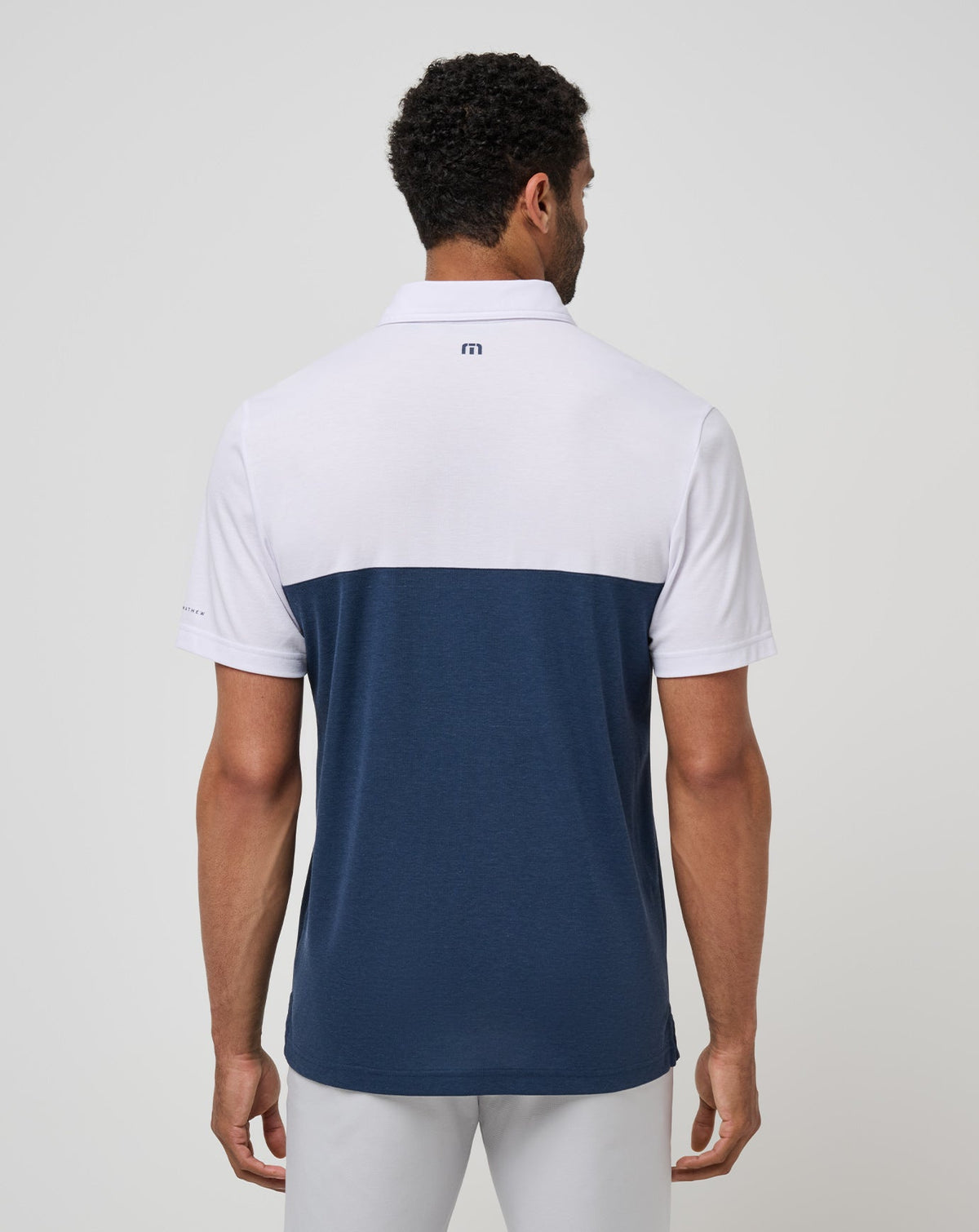 Auburn Drop Back Polo White/Navy | Travis Mathew Trusted