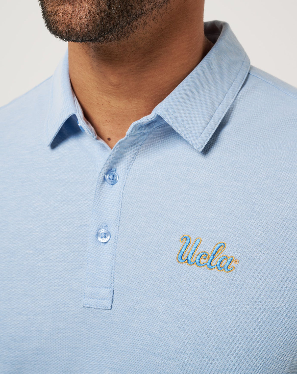 UCLA School Pride Polo Heather Blue | Travis Mathew Trusted