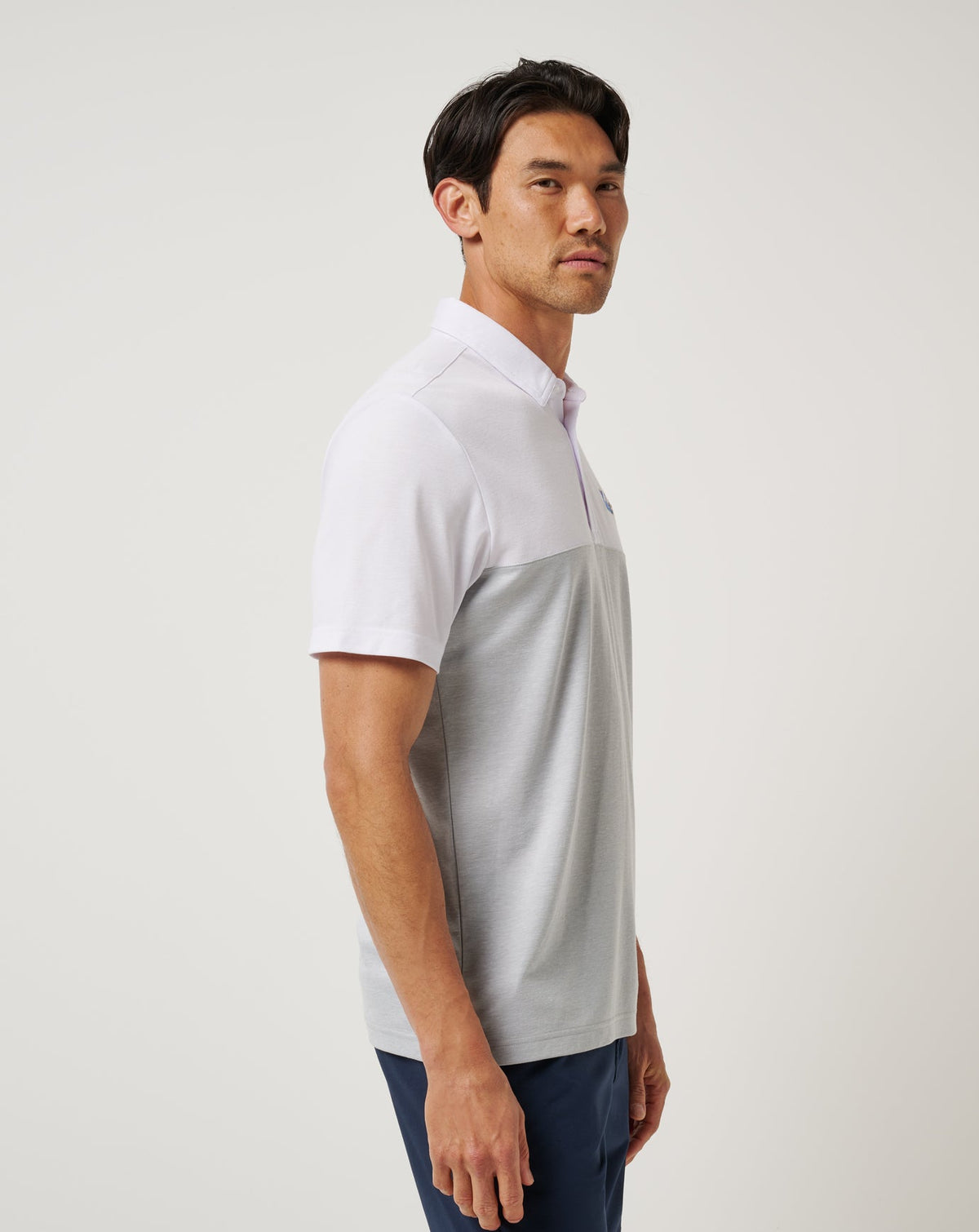 UCLA Drop Back Polo White/Heather Grey | Travis Mathew Everyday