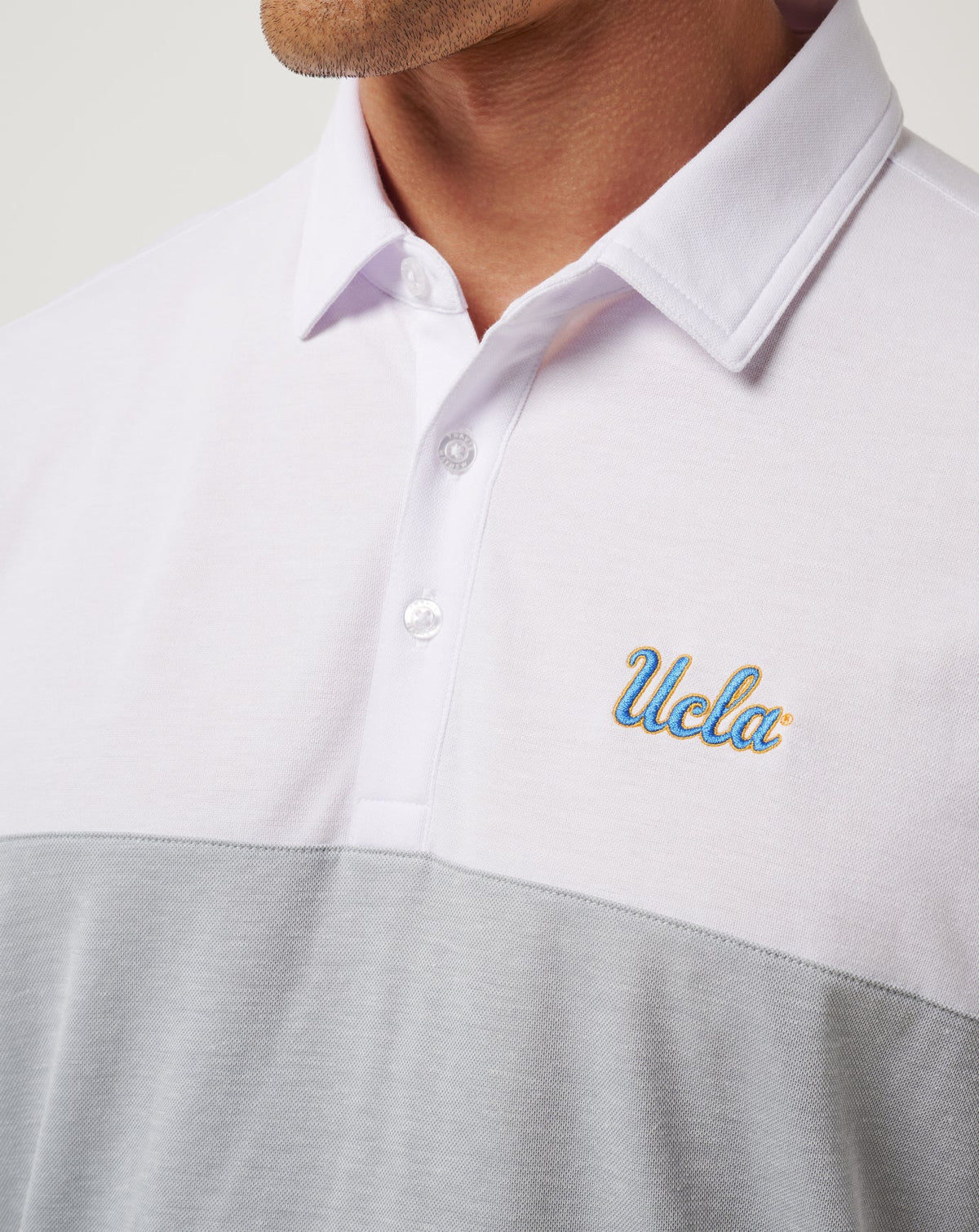 UCLA Drop Back Polo White/Heather Grey | Travis Mathew Everyday