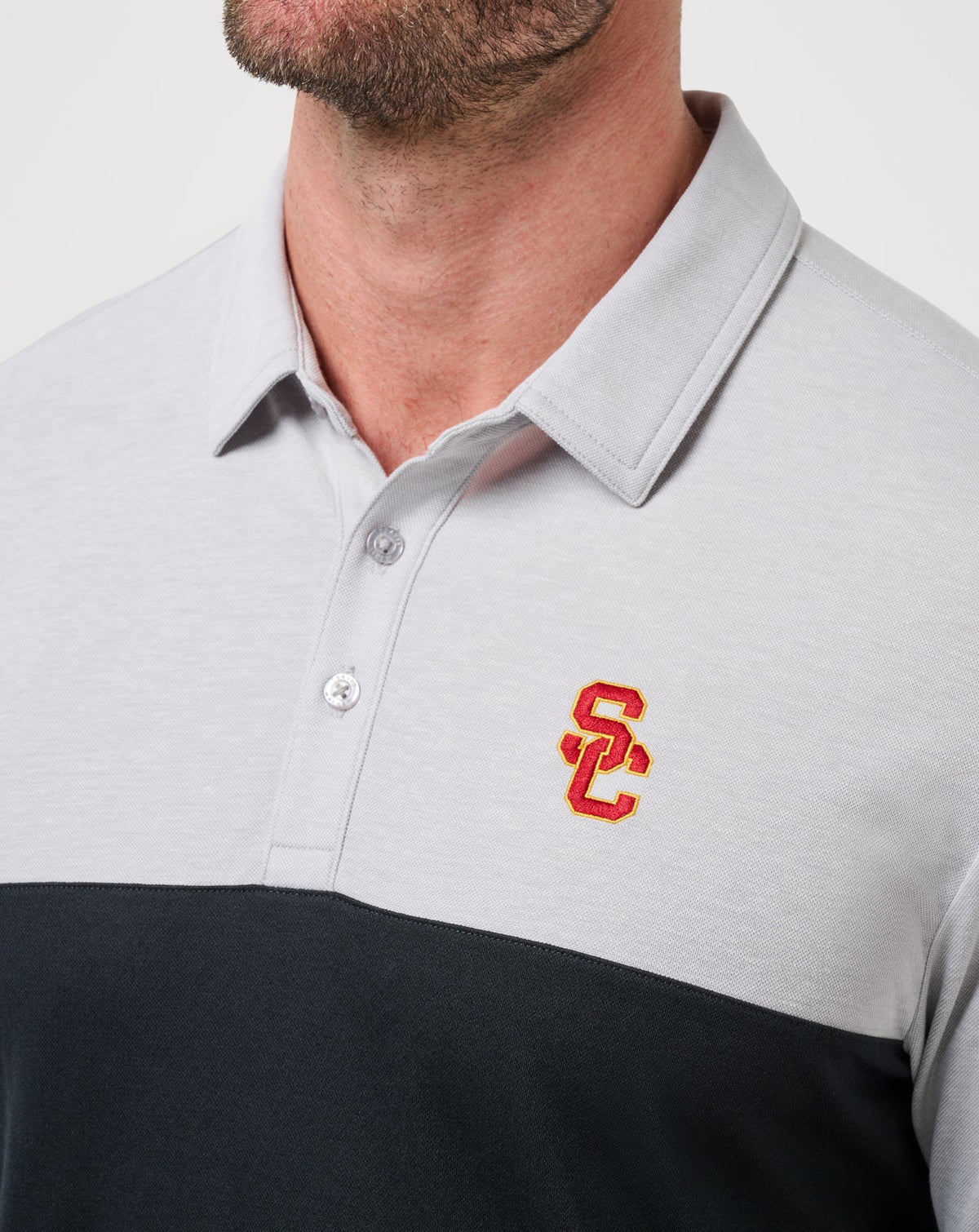 USC Drop Back Polo Heather Grey/Black | Travis Mathew Latest