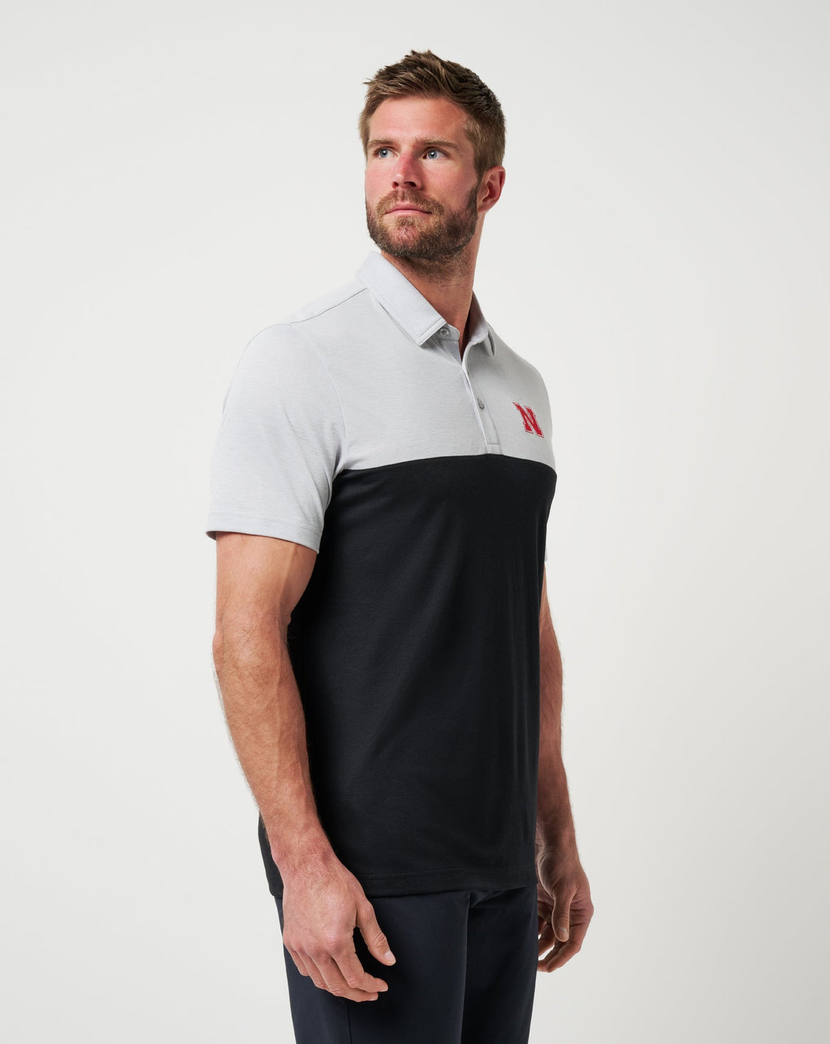 Nebraska Drop Back Polo Heather Grey/Black | Travis Mathew Trusted