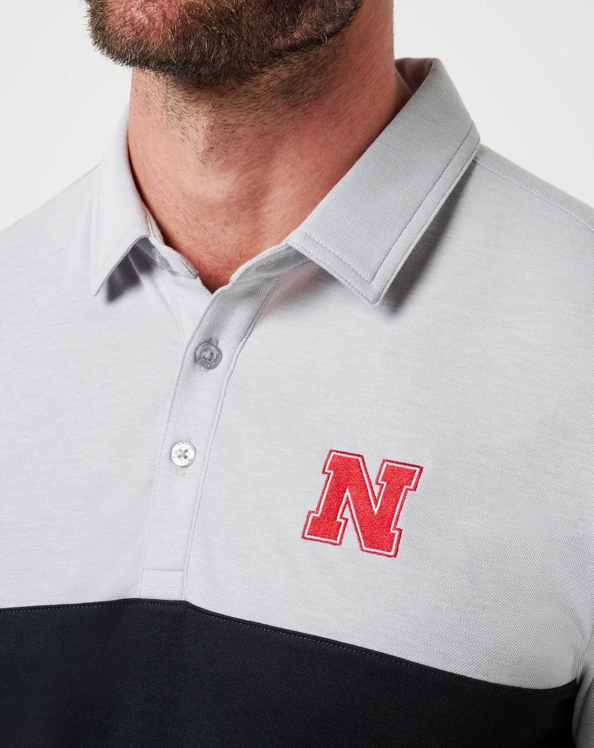 Nebraska Drop Back Polo Heather Grey/Black | Travis Mathew Trusted