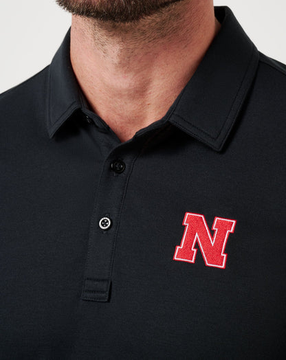Nebraska School Pride Polo Black | Travis Mathew Smart Buy