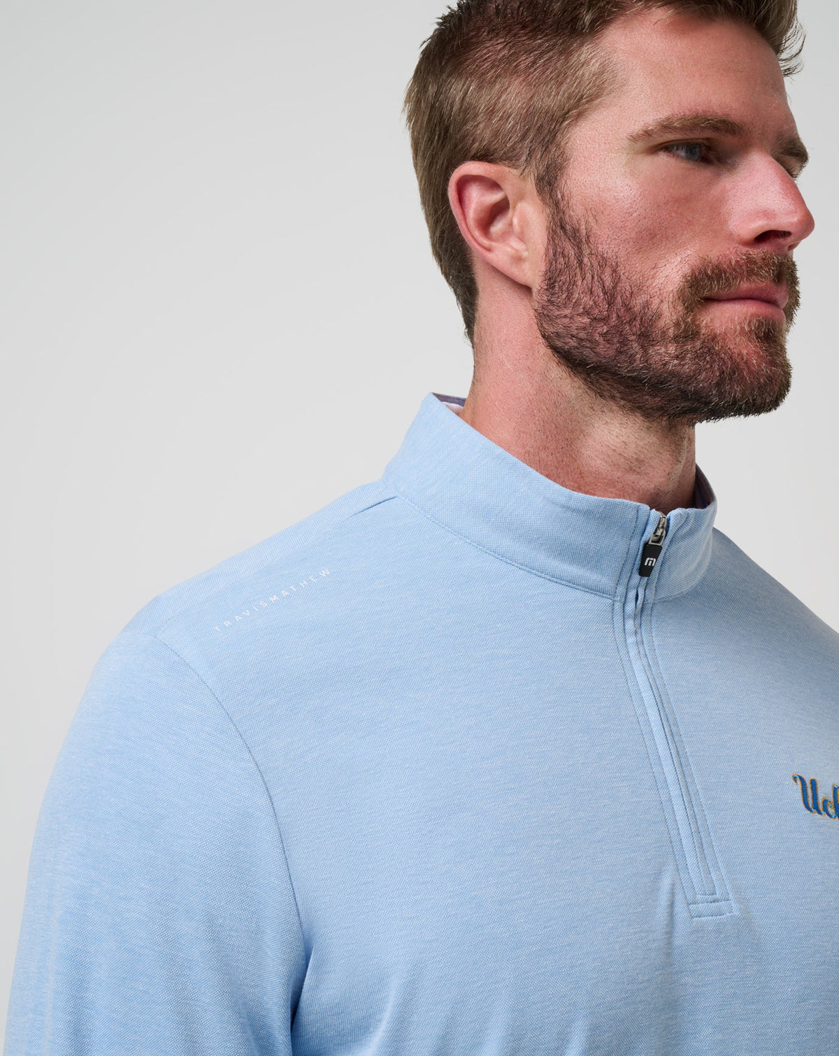 UCLA Time To Tailgate Quarter Zip Heather Blue | Travis Mathew Premium