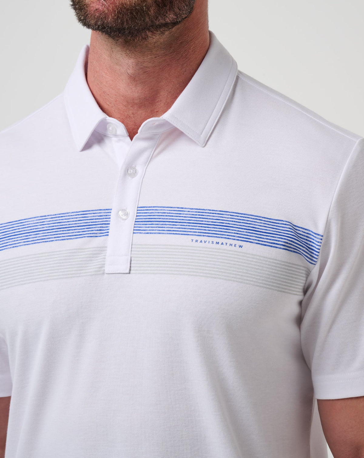 Kansas Top Recruit Polo White/Blue | Travis Mathew Signature