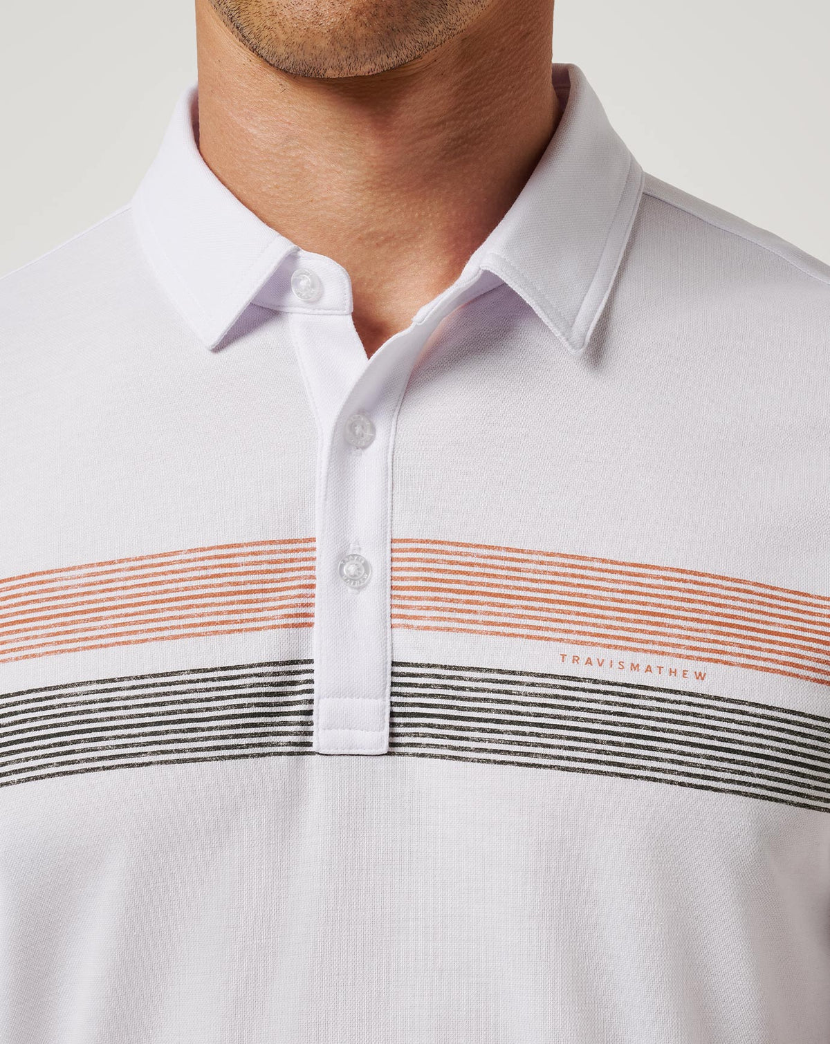 UT Austin Top Recruit Polo White/Orange | Travis Mathew Deals