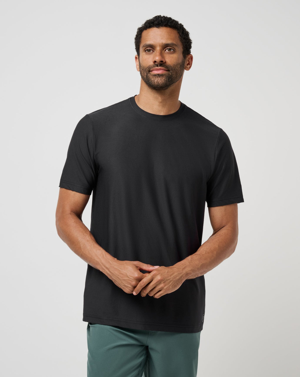 First Day Active Tee Black | Travis Mathew Featured