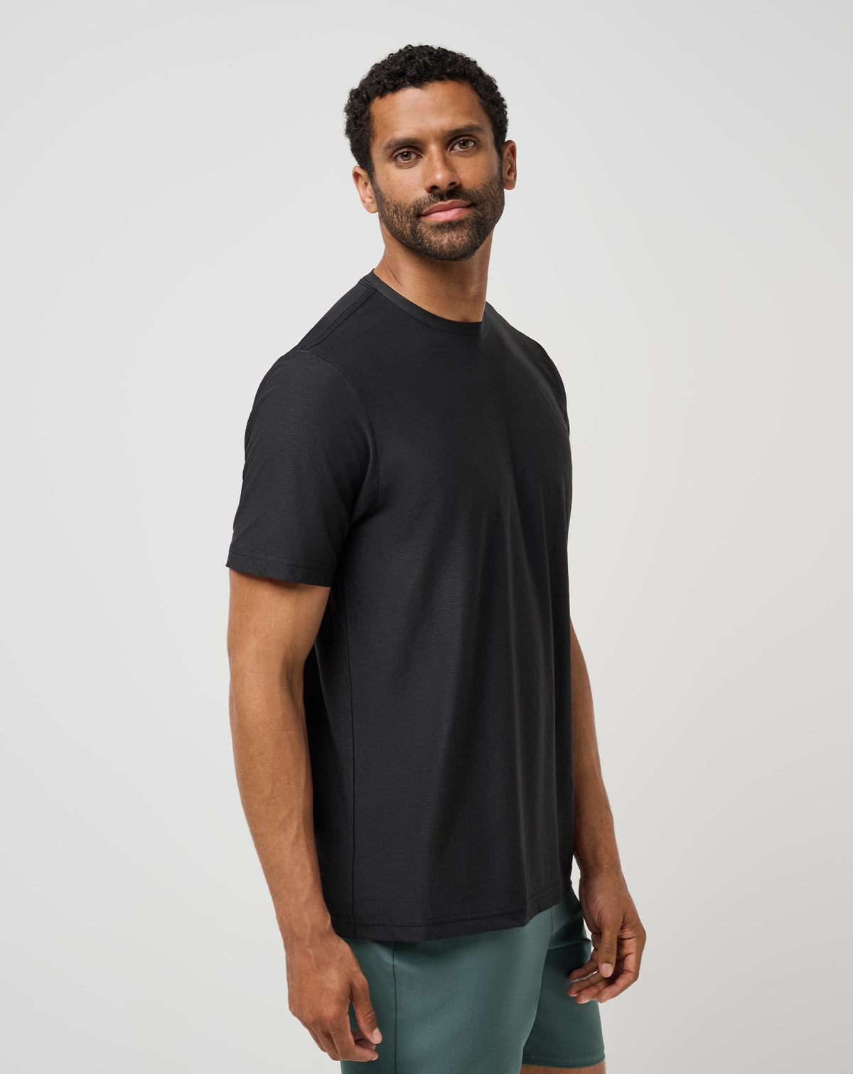 First Day Active Tee Black | Travis Mathew Featured